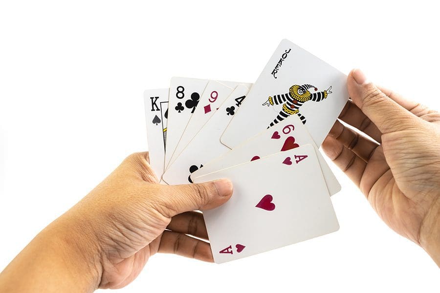 Joker-card-in-the-hand-of-man